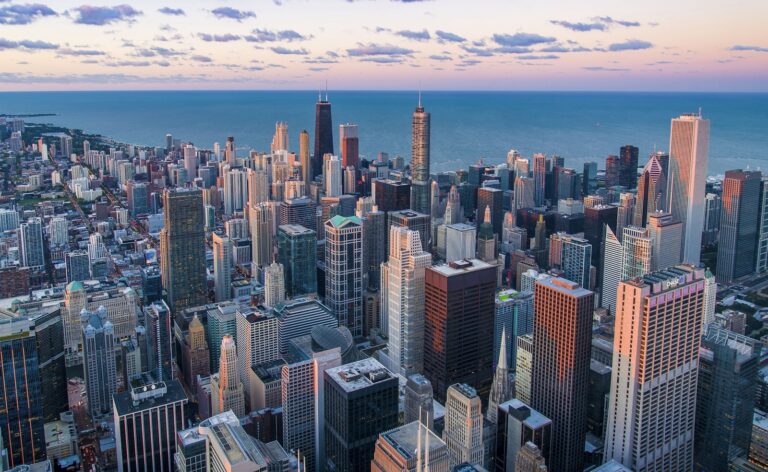 A city street and skyline at dusk